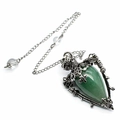 Detailed close-up of teardrop green stone pendant with rose and pentagram silver engraving - Green Aventurine + Pendulum Chain
