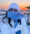 Detailed view of white plush hat, blue scarf, and embroidered gloves for winter warmth - Mohair Solid Blue Large Version