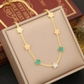 Golden clover necklace with white and green charms on a flat snake chain displayed in a box - 1# Necklace
