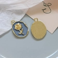 Detailed macro view of vintage gold rose pendants with blue enamel and pearl inlay details - 3# Dusty Blue