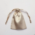 Glossy golden satin drawstring pouch with a smooth silk-like texture for gift packaging - Milk Tea