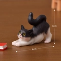 Miniature resin black and white tuxedo cat figurine in a stretching pose 4cm x 3cm - No.10 Stretching Black Cat