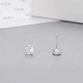 Detailed view of S925 sterling silver six-prong stud earrings with round white zircon - 2mm 1 Pair