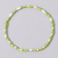 Handmade beaded bracelet with grass green, white, and golden seed beads for summer style - Grass Green White Gold