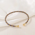 Handcrafted multicolor woven cord bracelet featuring gold-tone metallic open ends - Multicolor Mixed
