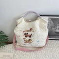 White quilted tote bag with cute dog embroidery and purple handles in variant style - Skateboard Dog White