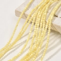 Macro detail of 3mm natural yellow shell beads strands for DIY jewelry making - 10# Light Yellow Shell Round Beads / Approx. 126pcs/3-3.5mm