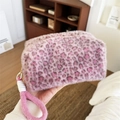 Plush pink leopard print cosmetic bag with soft wrist strap and zipper closure - Handheld Plush Pink Coffee Leopard