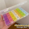 Detail of 28-grid colorful storage box showing individual rainbow compartments for jewelry - Colored-28 Grids