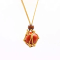 Handmade woven net necklace featuring a natural red crystal stone and wooden bead accent - Red Jasper