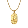 Detailed close-up of Scorpio zodiac pendant in gold with sparkling cubic zirconia stones - Scorpio