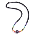 Black beaded chakra necklace with rainbow stones and a central purple tiger eye pendant - Amethyst Necklace