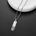 Silver stainless steel chain with rectangular number 13 cutout pendant on white plate - Number 13 (B)
