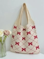 Knitted tote bag with red bow pattern and diamond lattice design in cream white - Apricot and Red