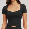 Slim fit black yoga short sleeve crop top with heart-shaped neckline and seam detail - S / Premium Black