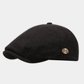 Detail of vintage plaid newsboy cap showing dense fabric texture and small m logo patch - One Size / Black