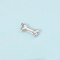Silver dog bone pendant charm with zircon stone inlay and glossy metallic finish - Steel April