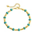 Pulsera bohemia de latón chapado en oro de 18K con cuentas azules y doradas facetadas - Chapado en Oro de 18K