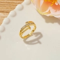 Detail of gold nail ring with pavé cubic zirconia on textured ceramic plate - Style E (Double-row Diamond Nail)