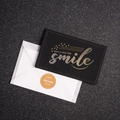 Black greeting card with gold foil text, translucent envelope, and golden seal sticker - Style G-Smile