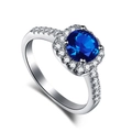Elegante S925 sterling zilveren ring met ronde blauwe zirkoon en zijsteen accenten - US 9 / Blauw
