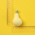 Handmade crochet pear keychain in yellow and green yarn with size measurement ruler - Yellow Crochet Knitted Pear