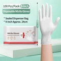 White disposable nitrile gloves in 9-inch length pack of 100 for versatile kitchen cleaning - 100 Pieces Size M 9 Inches White