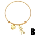 Gold adjustable bangle with engraved heart and sparkling zircon soccer boy pendants - Heart Soccer