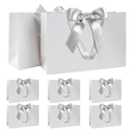 Eight white paper gift bags in large and small sizes with elegant silver ribbon handles - Set of 6 / White