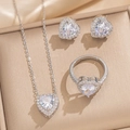 Luxurious heart-shaped zirconia necklace, earrings, and ring set in a gold jewelry box - Silver White Zircon Heart 3-Piece Set (8852)