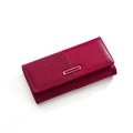 Detailed view of dark red patchwork long wallet with wave texture and gold logo buckle - Burgundy