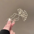 Silver ginkgo leaf hair fork with triple-prong wavy design for elegant bun styling - Ginkgo Leaf Hair Comb - Gold