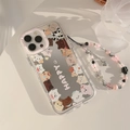 Detailed view of clear iPhone case with cartoon pig print and beaded wrist strap - Mirror Cat With Pink Lanyard / 16pro