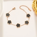 Roségoldenes Armband mit fünf schwarzen Kleeblatt-Motiven und feinem Perlenrand - 967 Schwarzes Muschelarmband Roségold