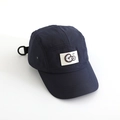 Detail of navy five-panel camping cap featuring white square patch and G letter embroidery - 52cm / Navy Blue