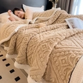 Thick beige flannel fleece blanket with embossed geometric patterns and white plush lining - Caramel