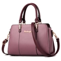 Elegant purple PU leather handbag with wine red handles and gold hardware details - Purple