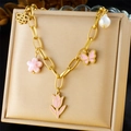 Golden charm bracelet with pink tulips, bees and butterfly charms on jewelry box - Tulip Bee Flower Artificial Pearl Necklace (N3120)