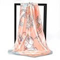 Detailed view of square silk scarf with horse carriage print and blue borders hanging - Pink Orange Carriage Polka Dot (014)