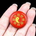 Handheld 25mm red agate pendant with golden Yin Yang Bagua symbol engraved on its surface - Red Jasper