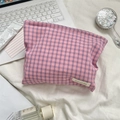 Close-up of pink checkered cotton makeup bag with Sokakka label on white desk - Wrinkled Blue Pink Plaid