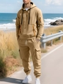 Détail de l'ensemble sweat à capuche et pantalon cargo kaki avec zips orange vifs - S / Kaki