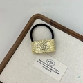 Elastic hair tie with rectangular gold metal charm featuring a lava-inspired crinkled texture - Gold Rectangular Wrinkled