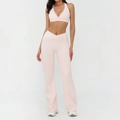 Pink yoga set featuring cross waist flared leggings and V-neck sports bra with pockets - S / Sports Bra & Flared Pants (Top And Bottom) / Light Pink