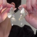 Detailed view of silver butterfly cutout earrings with sparkling zircon drop pendants - Silver Hollow Butterfly (31#)