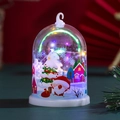 Detail of a bell-shaped Christmas LED night light with snow scene and colorful lights - F Colorful Light