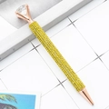 Ballpoint pen with yellow rhinestones, a large clear diamond top, and rose gold metal finish - 1.0mm Bullet Tip / Yellow