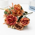 Close-up of vintage artificial hibiscus rose bouquet in autumn caramel and brown tones - Brown Red
