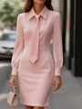 Detail of pink long sleeve lapel dress with matching tie and beige leather handbag accessory - S / Pink
