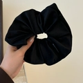Oversized black ribbed scrunchie with polka dot texture and elastic hair tie design - Black Velvet Scrunchie